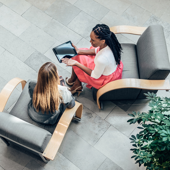 Two female employees in a meeting - Boyd Insurance